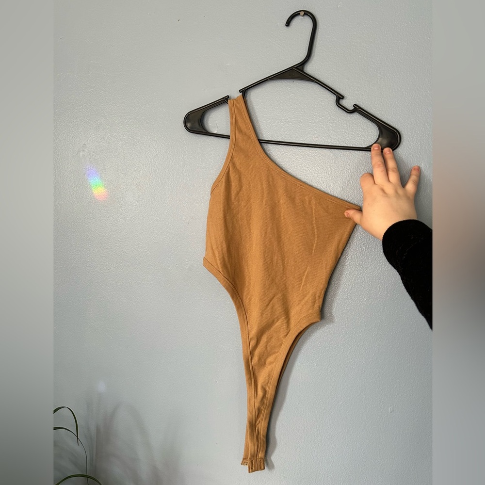 OGL asymmetrical multiwear bodysuit NWOT